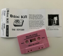 bikini kill - the -singles - tape cassette